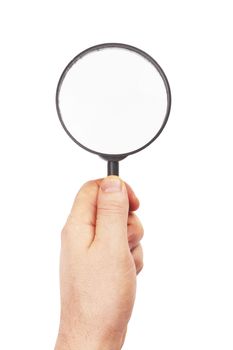 Looking trough magnifying glass in hand 