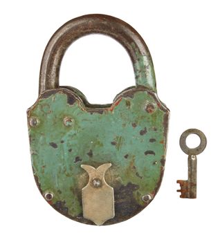 old padlock with key on a white background 