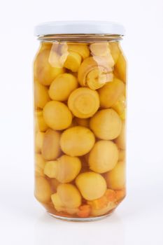Marinaded mushrooms in a glass jar