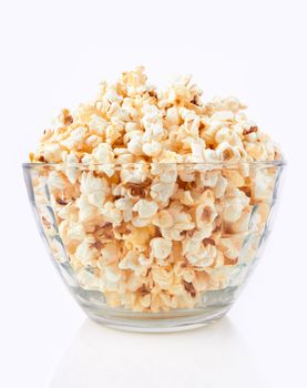 Bowl of popcorn, isolated on a whine background