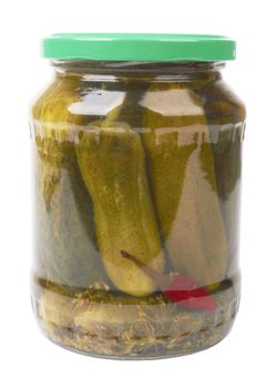 pickles in a glass jar is isolated on a white background 