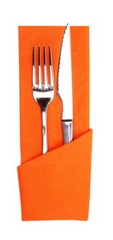 knife and fork on a napkin on the white