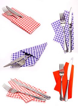 knife and fork on a napkin isolated on a white 