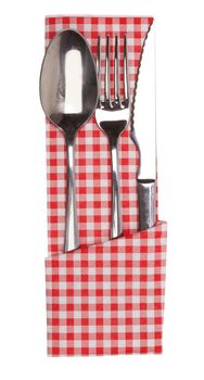 knife and fork on a napkin on the white