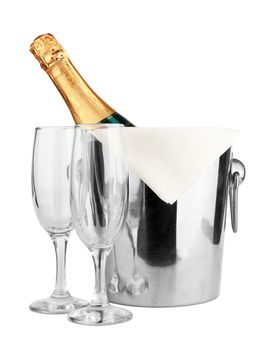 Champagne bottle in cooler and two champagne glasses 