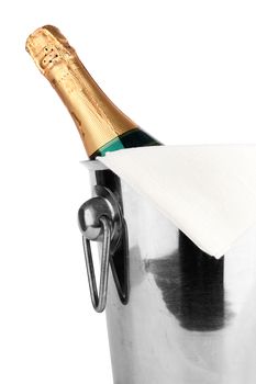 bottle of champagne in cooler with ice on white