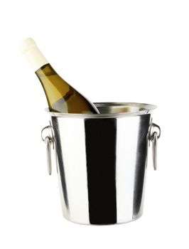 White wine bottle in cold ice bucket. Isolated on white 
