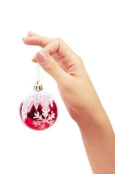 Hand holding a christmas ball isolated on a white background 