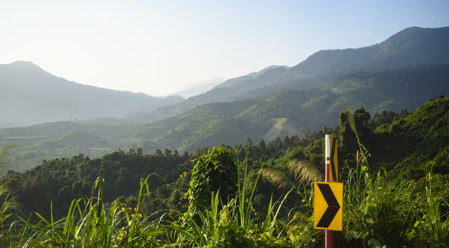 View of mountains and forests in the morning in fog in Vietnam.