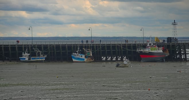 CANCALE, FRANCE - April 7th 2019 - Fishing boats docked at pier