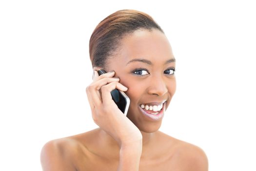 Cheerful phoning natural beauty on white background