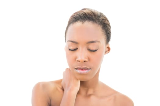 Natural beauty with hand on neck and closed eyes on white background