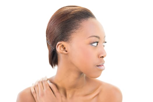 Side view of natural beauty looking away on white background