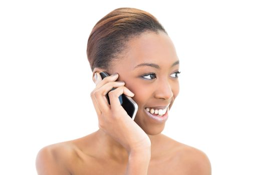 Beautiful smiling beauty phoning on white background