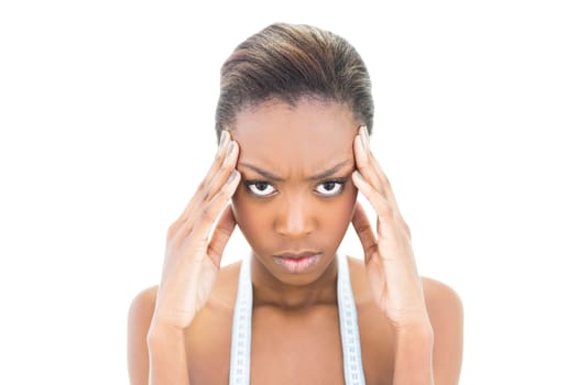 Furious natural beauty with measuring tape over the neck on white background