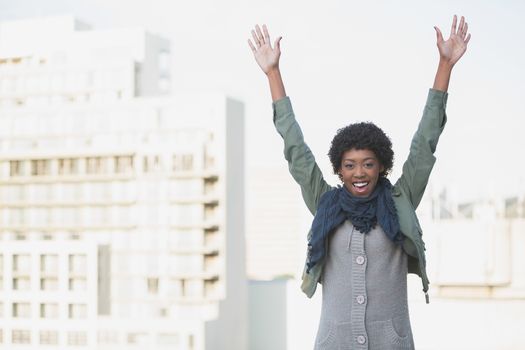 Cheerful afro model having fun outdoors on a sunny day