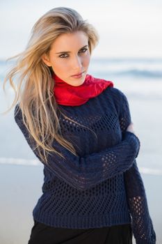 Gorgeous sexy blonde posing outdoors on a beautiful wild beach