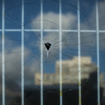 Broken glass window outside