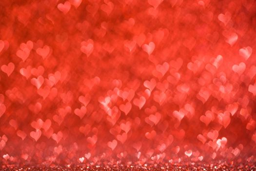 Shiny red heart love bokeh glitter lights abstract background, Valentine's day party celebration concept