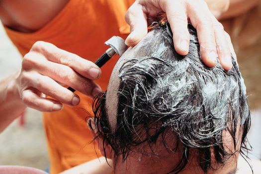 The ceremony of shaving the hair, Buddhist Ordination