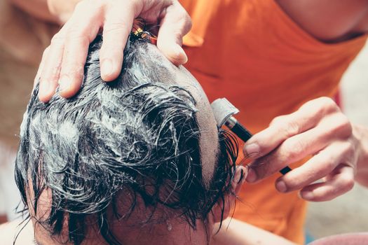 The ceremony of shaving the hair, Buddhist Ordination