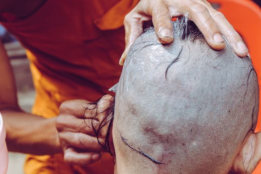 The ceremony of shaving the hair, Buddhist Ordination