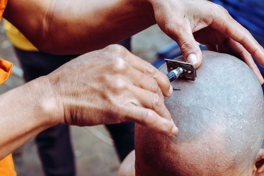 The ceremony of shaving the hair, Buddhist Ordination