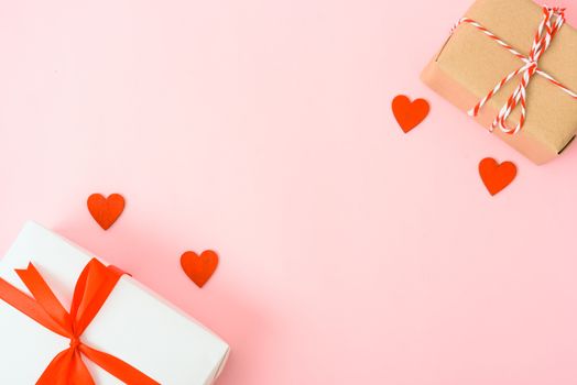 Valentine's Day Concept, Top view Flat lay, red heart and gift box on Pink background with copy space for your text