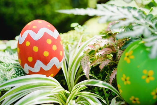 Beautiful Easter Multi color egg on garden, Easter day concept