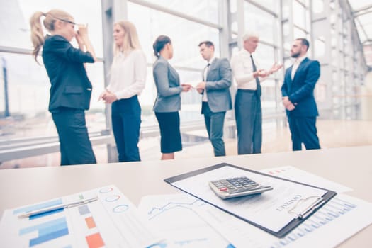 Co working conference, Executive team discussing the charts and graphs working in business strategy and financial plan to investment profit