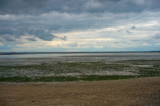 View on Atlantic ocean from sandy beach at Cancale, France