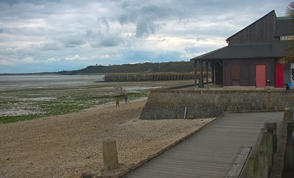 View from boardwalk at Atlantic ocean shore in Cancale, France