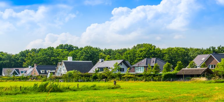 countryside houses with a big grass pasture in bergen op zoom, The netherlands