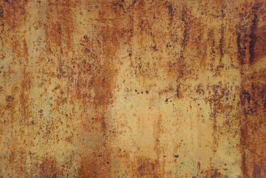 Brown background: old metal surface with orange paint and creased texture