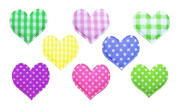 Multicolored  textile hearts isolated on a white background