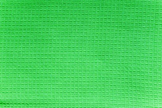 Texture of green cotton waffle towels closeup