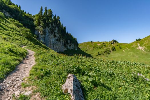 Fantastic hike in the Tannheim Mountains from the summit of Neunerkopfle over Landsberger hut to the beautiful Vilsalpsee.