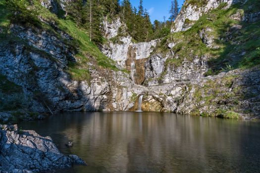 Wonderful hike through the magical waterfalls at the Stuibenfalls on the Plansee in Reutte, Tyrol