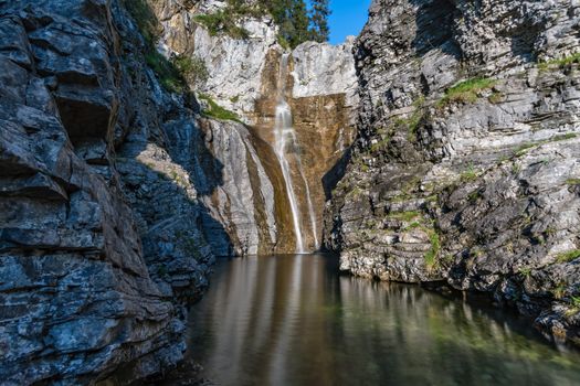 Wonderful hike through the magical waterfalls at the Stuibenfalls on the Plansee in Reutte, Tyrol