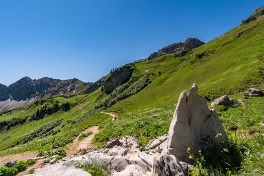 Fantastic hike in the Tannheim Mountains from the summit of Neunerkopfle over Landsberger hut to the beautiful Vilsalpsee.