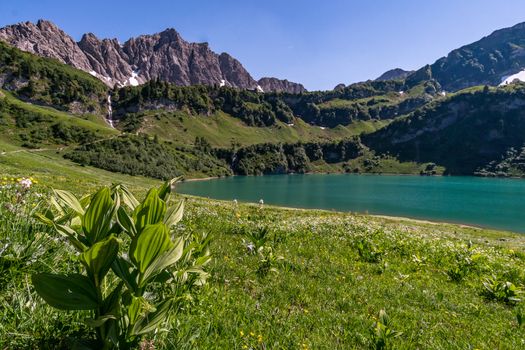 Fantastic hike in the Tannheim Mountains from the summit of Neunerkopfle over Landsberger hut to the beautiful Vilsalpsee.