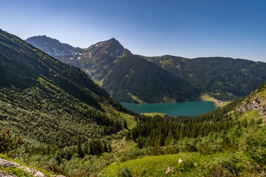 Fantastic hike in the Tannheim Mountains from the summit of Neunerkopfle over Landsberger hut to the beautiful Vilsalpsee.