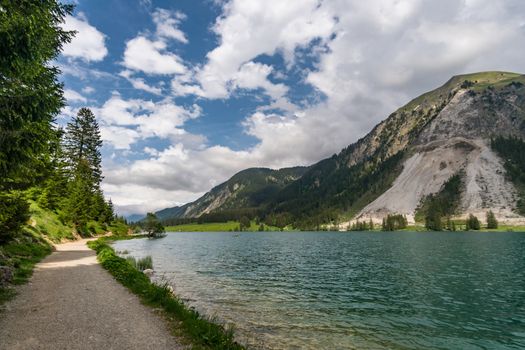 Adventurous hike around Vilsalpsee to the great Bergaicht waterfall in the Tannheimer Tal