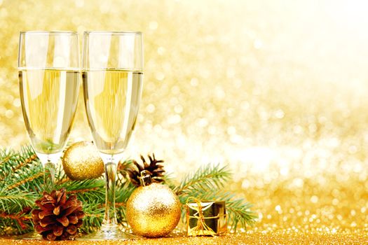 Glasses of champagne and decoration with natural fir branch