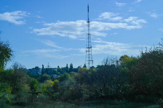 Television tower construction to transmit signals TV. Countryside skyline landscape