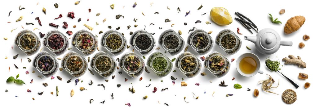 Large assortment of tea on a white background. The view from the top.