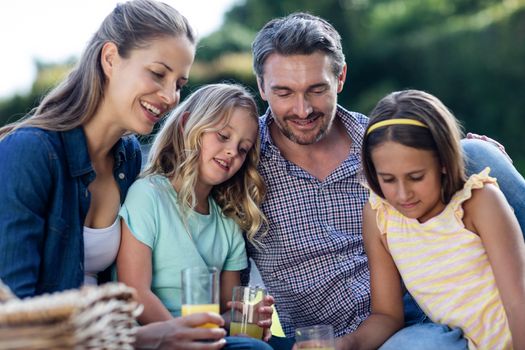 Family having a picnic in the garden