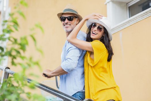 Portrait of stylish couple strolling outdoors