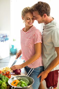 Romantic couple in kitchen at home