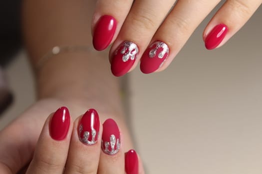Youth manicure design, color red and silver